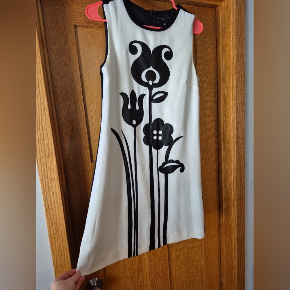 Asymmetrical White and Black A-line Dress with Sleeveless Design